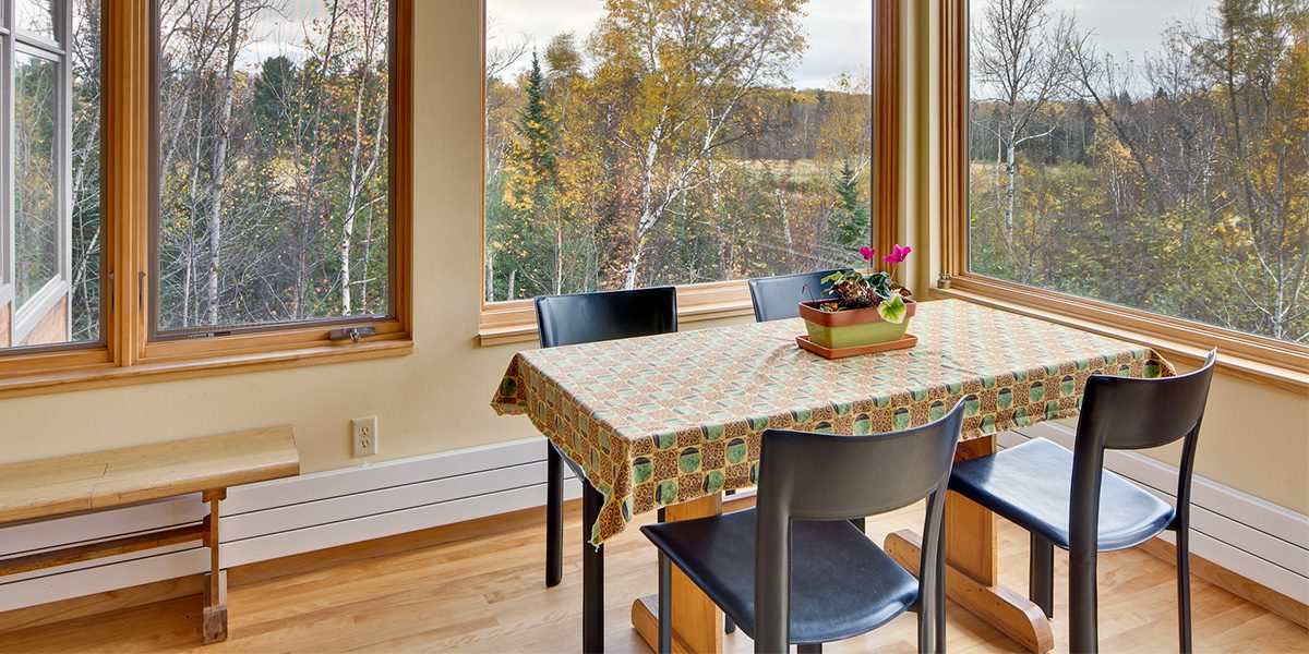 Table in dining room with windows